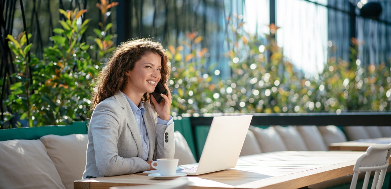 Young business woman on a laptop.