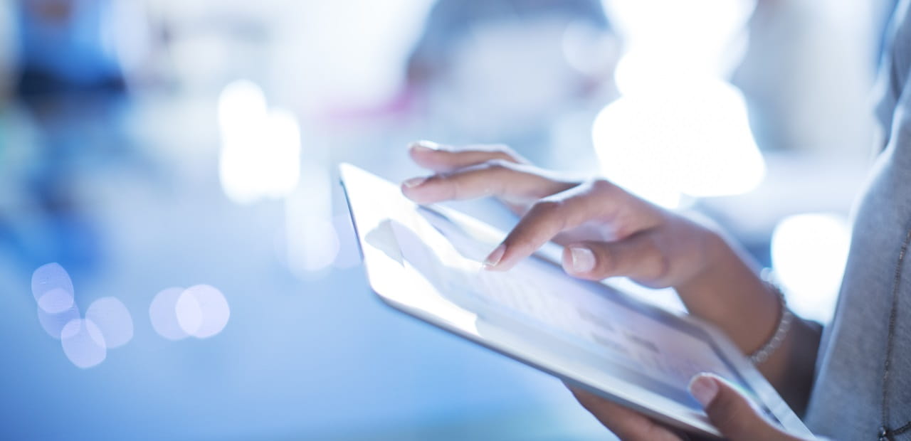 Close up businesswoman using digital tablet