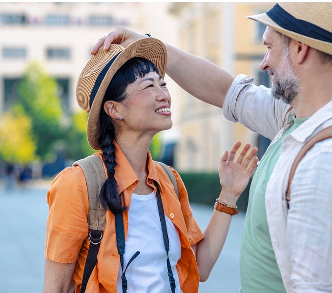 Couple wearing the same hat