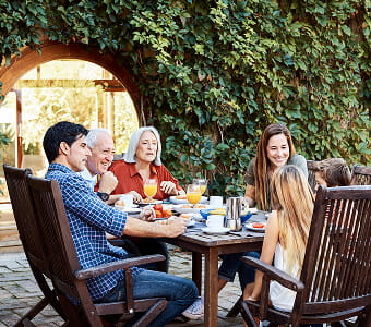 Family having dinner together outside
